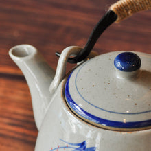 Load image into Gallery viewer, a close up of a hand-painted ceramic teapot