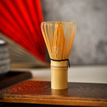 Load image into Gallery viewer, a close up of a bamboo whisk
