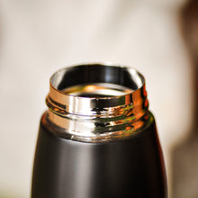 Load image into Gallery viewer, a close up of a black thermos flask
