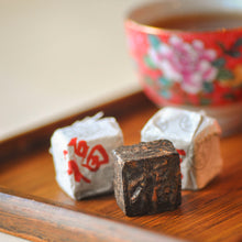 Load image into Gallery viewer, a close up details of mini bliss puerh tea brick

