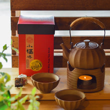 将图片加载到图库查看器，pottery teapot with a box of xiao fu zhuan beside
