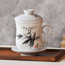 Muatkan imej ke dalam penonton Galeri, a close up of a infuser mug
