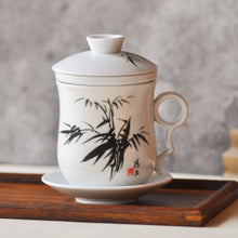 Load image into Gallery viewer, a close up of a infuser mug
