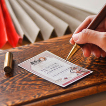 Muatkan imej ke dalam penonton Galeri, a close up of a women holding wooden pen writing mid-autumn greeting card
