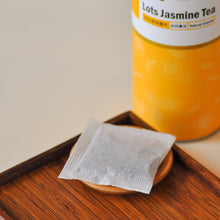 Muatkan imej ke dalam penonton Galeri, a close up of a jasmine tea bags
